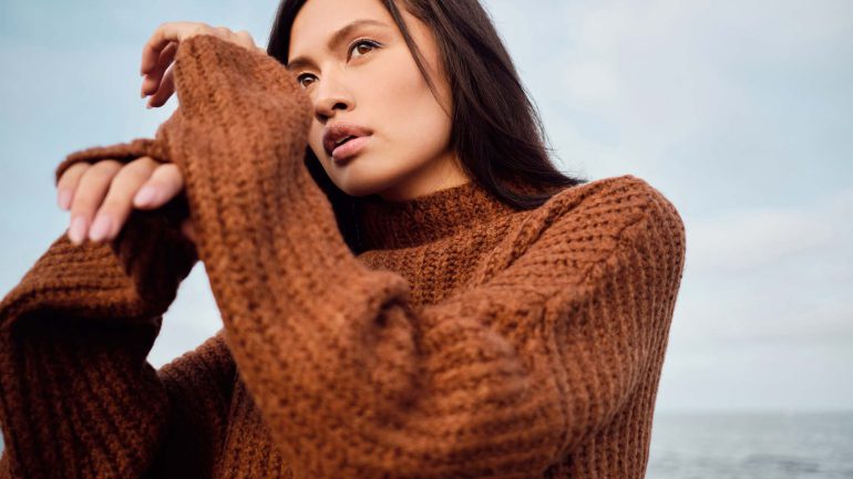 beautiful-asian-brunette-girl-in-cozy-knitted-JXDH6Q7.jpg